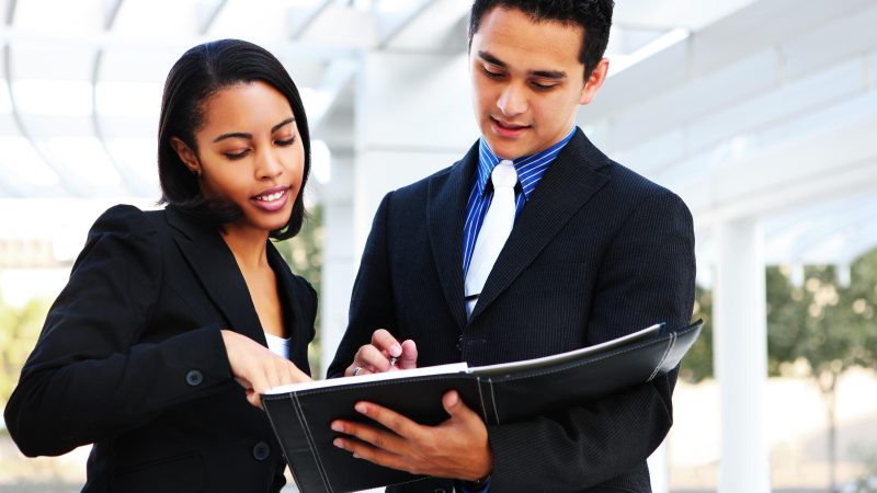 diverse_business_man_and_woman_40435468.jpg