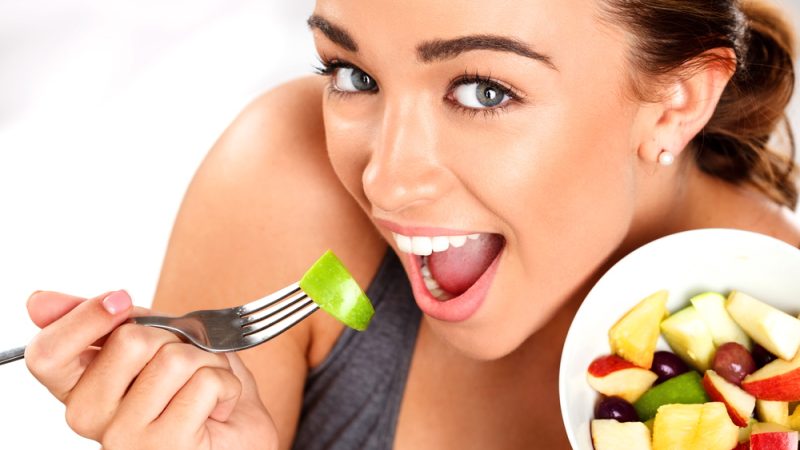 girl-enjoying-fruit-salad.jpg